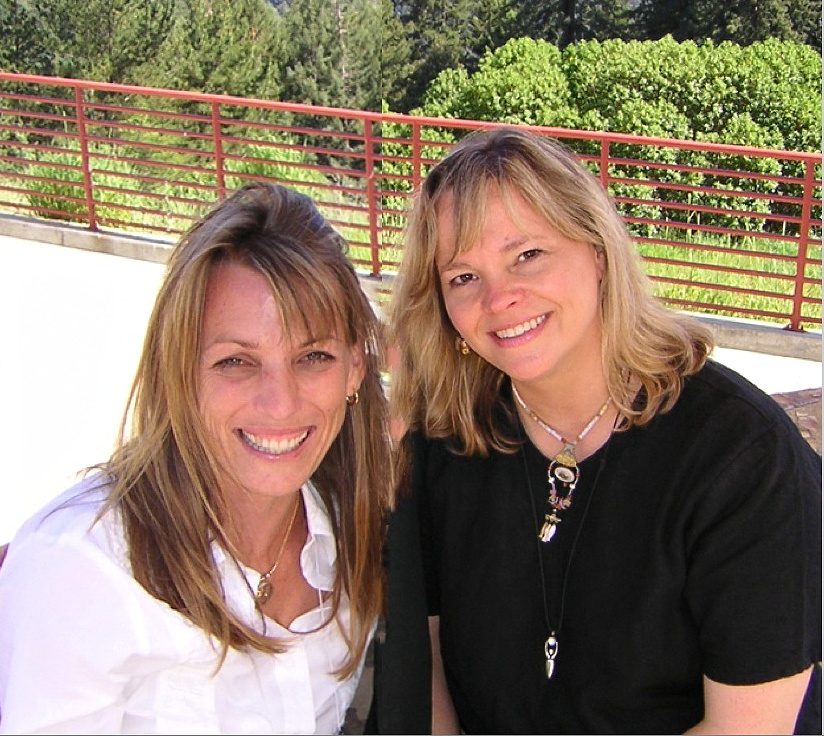 Kelly Wendorf, founder of Kindred Magazine, and Lisa Reagan on Mount Madonna, Santa Cruz, for the 2004 Alliance for Transforming the Lives of Children summit. Kelly bequeathed Kindred Magazine to Kindred World in 2009. She still serves on Kindred's board of directors and is a contributing editor to Kindred Magazine.